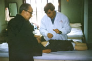 Dr Tinnion treating a patient